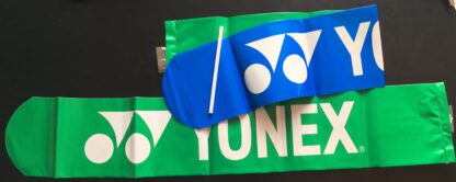 Uninflated thundersticks out of the packaging. Green and blue thundersticsk with Yonex in white writing. Includes straw to inflate the thundersticks.