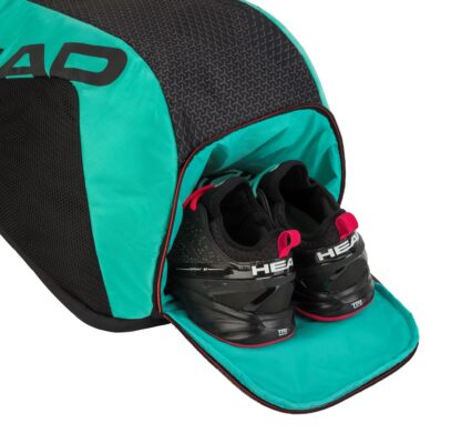 Top view of HEAD tennis bag. Black bag and teal.. Top with room for shoes.