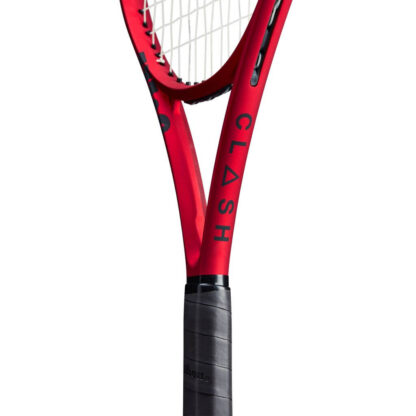Throat view of red matte tennis racquet with black top, white strings with red logo and black grip. Wilson Clash 100L v2.0.