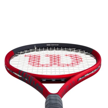 View from grip of red matte tennis racquet with black top, white strings with red logo and black grip. Wilson Clash 100L v2.0.