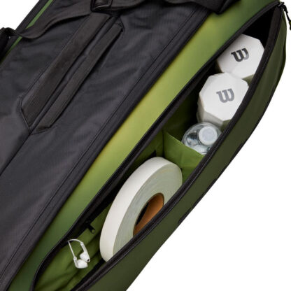 Black and olive racquet bag from Wilson. With space for 9 racquets. With a seperate room for accesories.