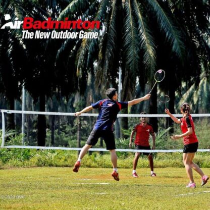 People playing badminton outdoor with the airshuttle.