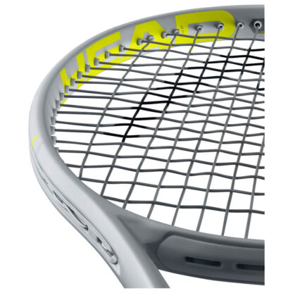 Throat view of grey and yellow tennis racquet from HEAD. Grey strings with black HEAD logo and yellow grip. HEAD in yellow writing on the inside of the beam. Extreme in yellow written on the beam from the throat to the middle of the racquet head. HEAD Extreme MP Graphene 360+.