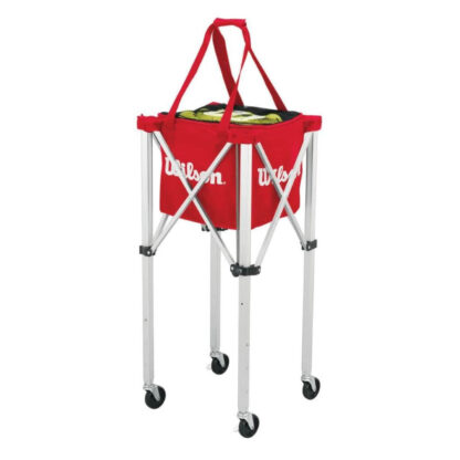Square bag for tennis balls from Wilson in red With metal legs and wheels. Black mesh on the top with white Wilson logo. Wilson in white writing on the sides of the bag.