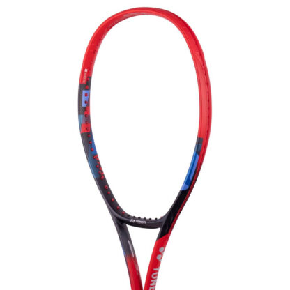 Close up of red, black and blue tennis racquet from Yonex. Yonex in silver writing on the side with silver Yonex logo. Yonex Vcore 100 2023 model.