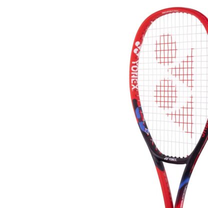 Close up of red, black and blue tennis racquet from Yonex. Vcore in white writing on the side. Yonex Vcore 25 2023 model.