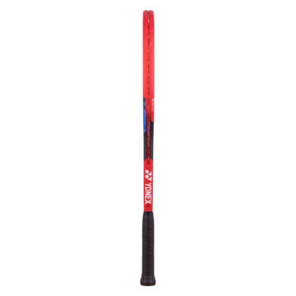 Side view of red, black and blue tennis racquet from Yonex. Black grip. Yonex in silver writing on the side with silver Yonex logo. Yonex Vcore 26 2023 model.