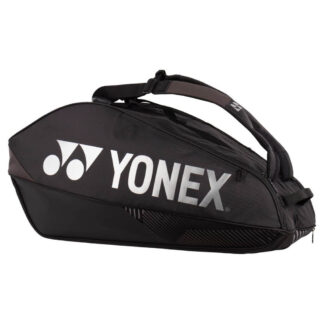 Black racquet bag from Yonex. Racquet bag for 6 racquets. Yonex in white writing along white Yonex logo. Details in black and different shades of grey.