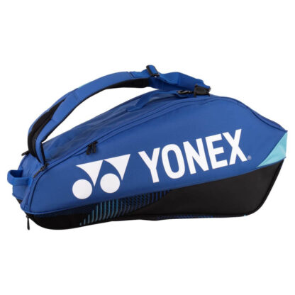 Blue racquet bag from Yonex. Racquet bag for 6 racquets. Yonex in white writing along white Yonex logo. Details in black and different shades of blue.