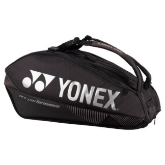 Black racquet bag from Yonex. Racquet bag for 9 racquets. Yonex in silver writing along white Yonex logo. Details in black and different shades of grey. Pro Performance in silver/grey writing.