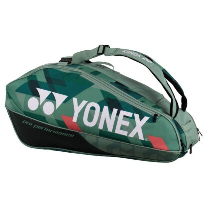 Green racquet bag from Yonex. Racquet bag for 9 racquets. Yonex in white writing along white Yonex logo. Details in red and different shades of green . Pro Performance in green writing.