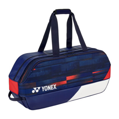 Navy/Blue square-ish badminton bag with blue, red and white details. Small whiteYonex logo. Yonex Pro Tournament Bag Limited Edition 2024 Olympics.