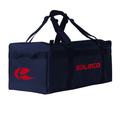 Side view of navy blue duffle bag from Solinco. Solinco in red writing on the side. Red Solinco logo on the side. The bag has carrying straps as well as multiple pockets. Solinco Tech Duffle in navy.